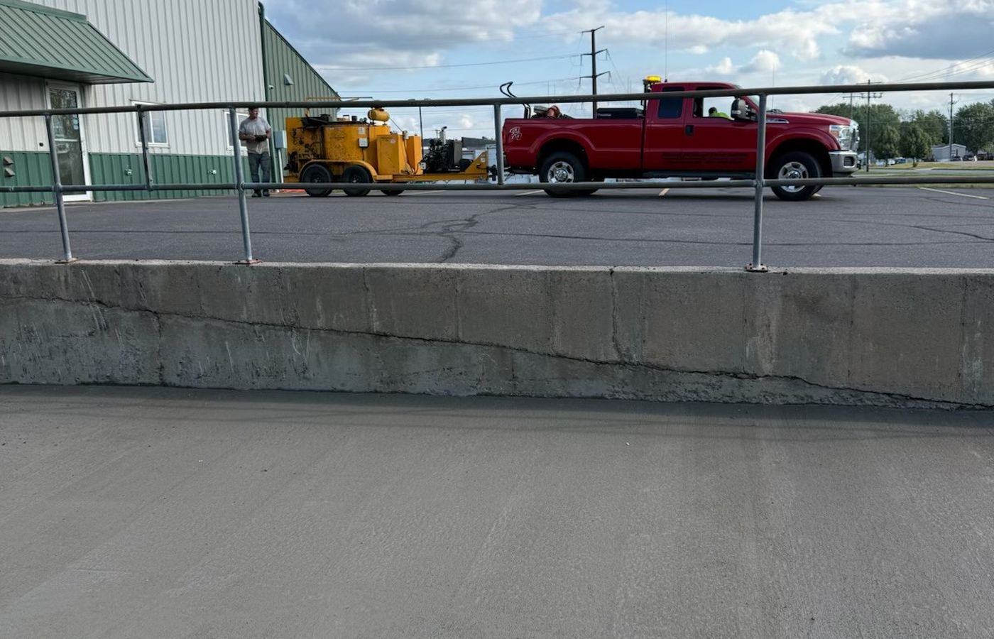 Direct-fire crack seal kettle on a job site