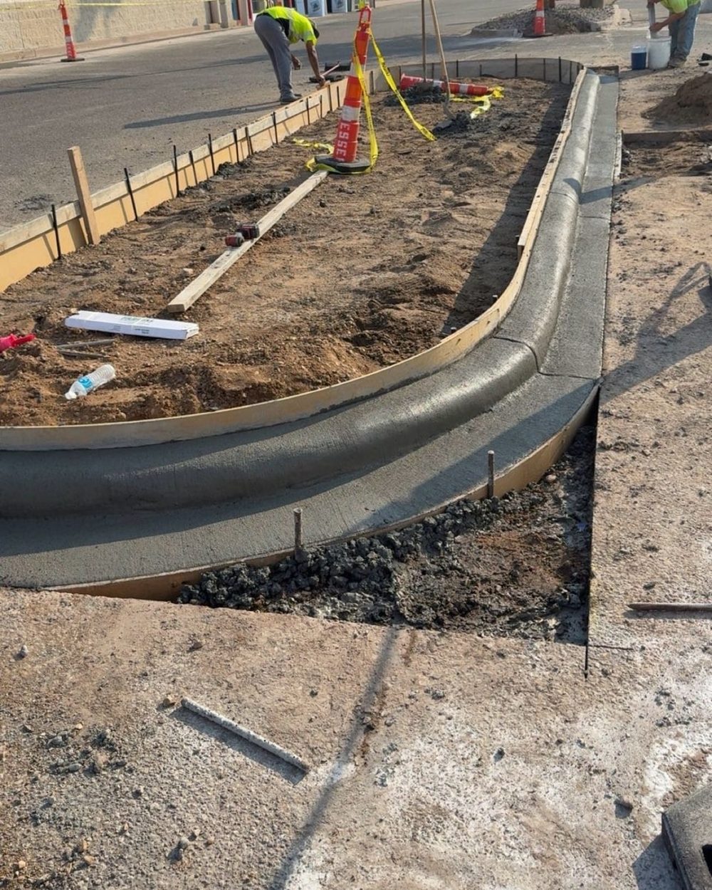 Curb and gutter formwork with rebar in place
